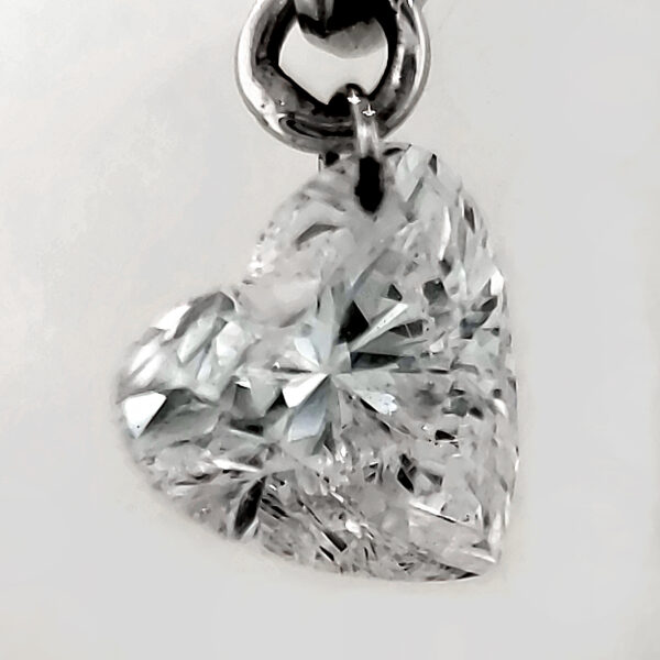 .95 tcw. Diamond Heart Earrings